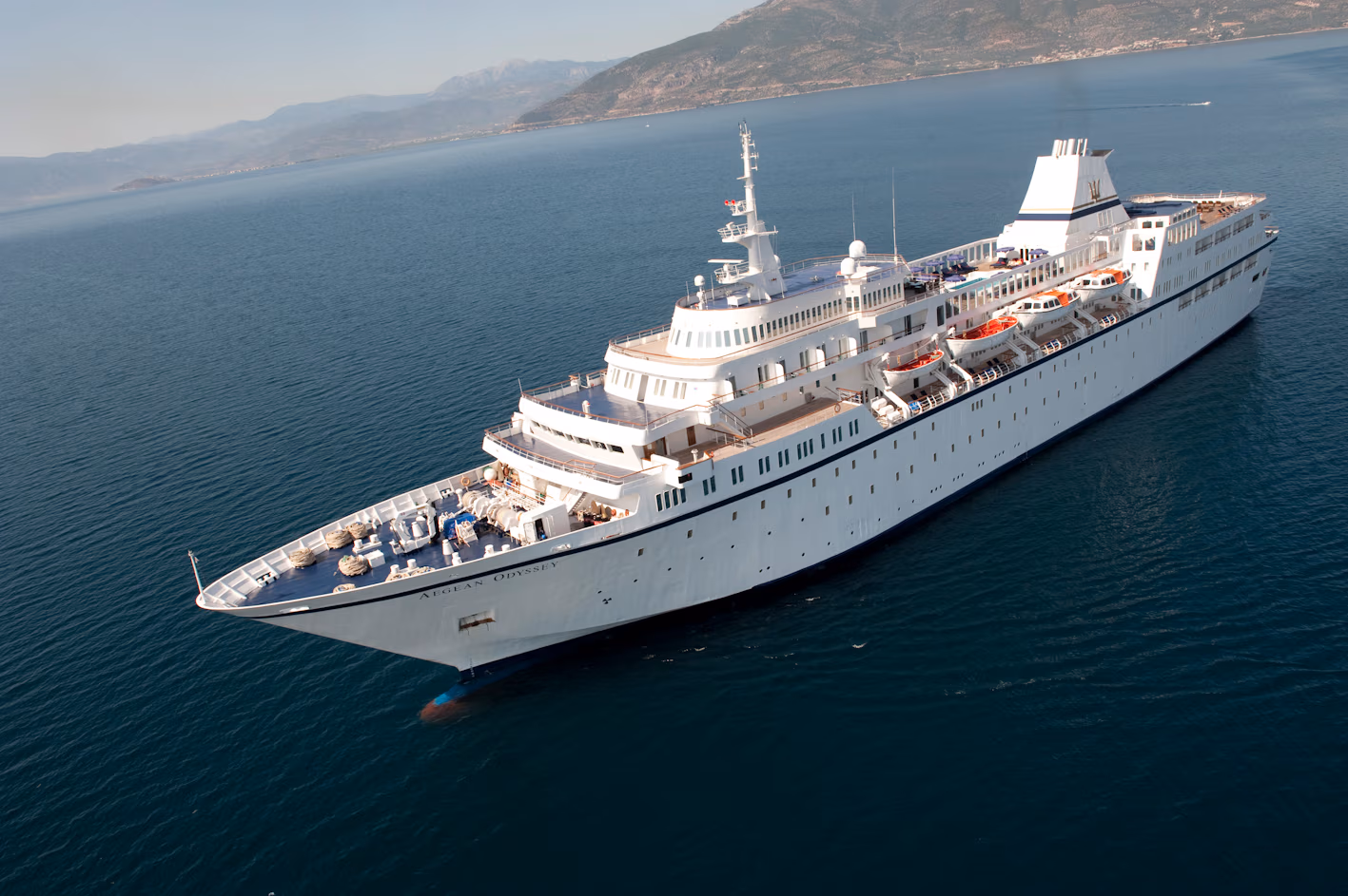 Cruise ship approaching the coast on The Riviera Bearing